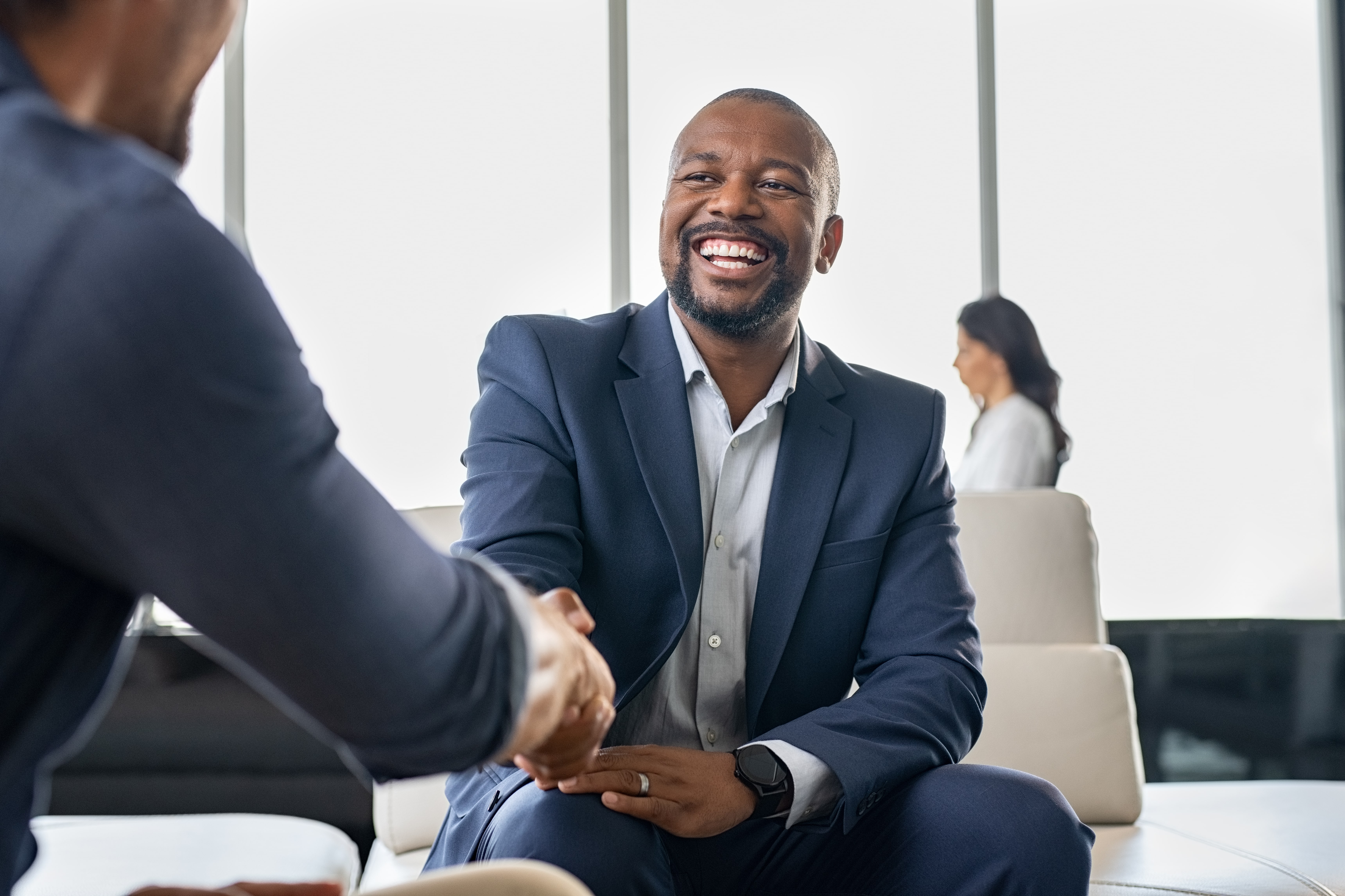 Black Man Shaking Hands 1671900805 Min